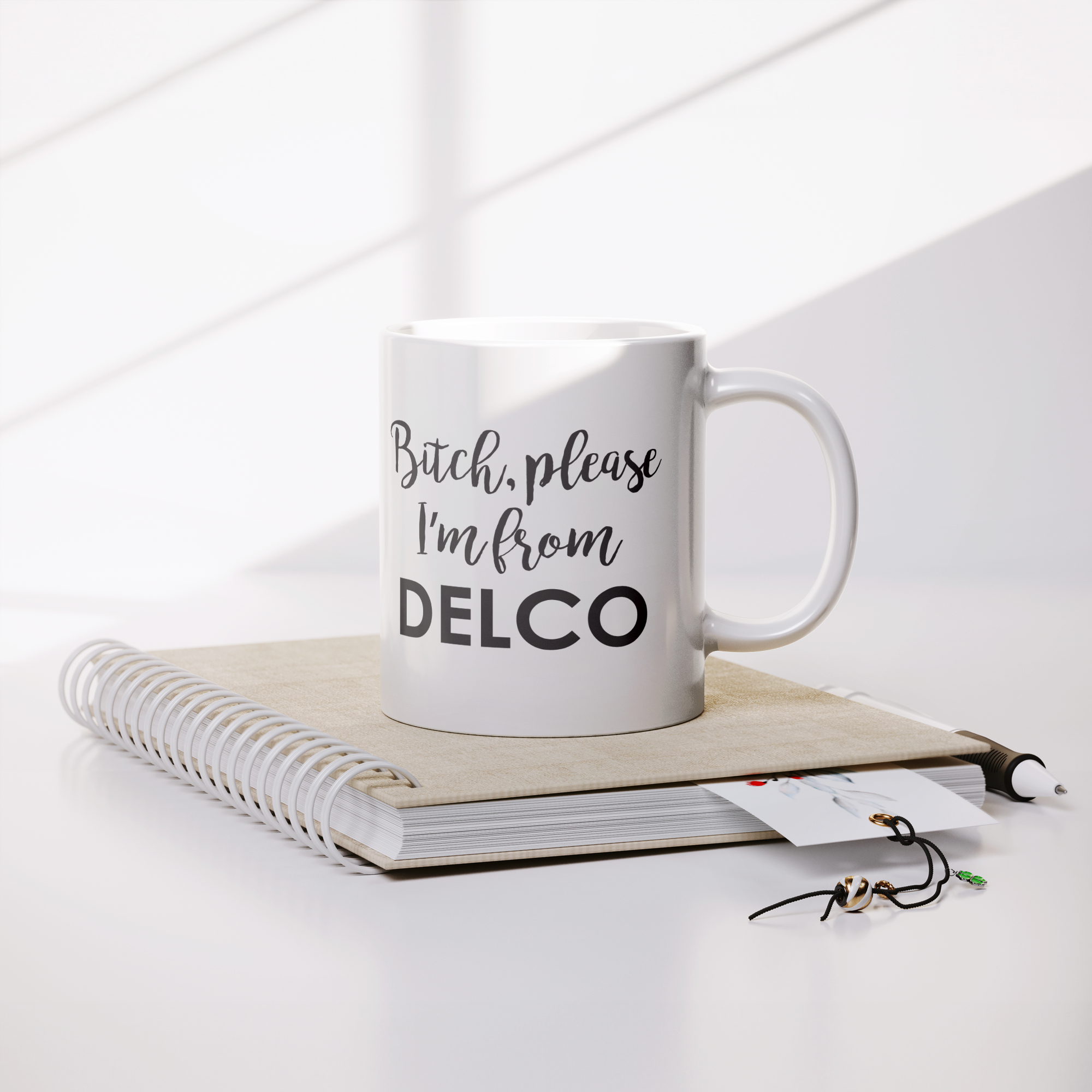 Bitch_Please_Im_From_Delco_Mug_Lifestyle_Notebook_Mockup.png