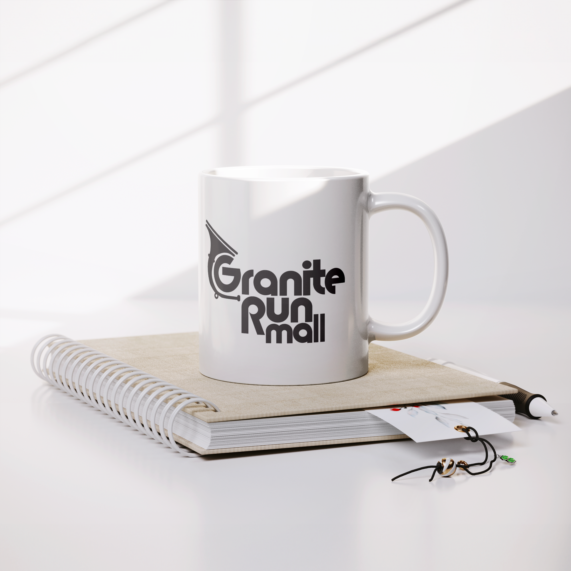 Granite_Run_Mall_Delco_Mug_Lifestyle_Notebook_Mockup.png