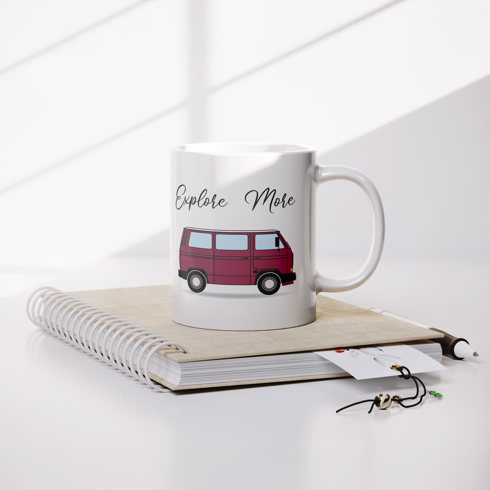 Maroon_Tin_Top_Van_Explore_More_Lifestyle_Notebook_Mockup.png